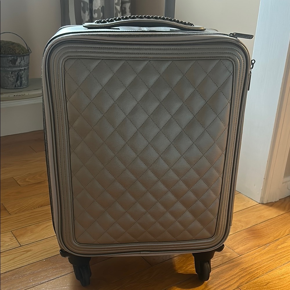 Quilted Gray Chanel leather Rolling Suitcase